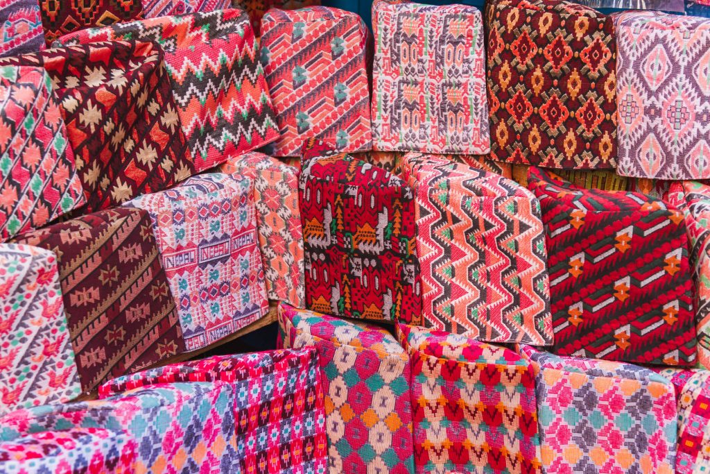 traditional Nepalese textiles with geometric patterns for sale at Asan Market