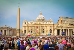 crowds as St. peters basilica in vatican city