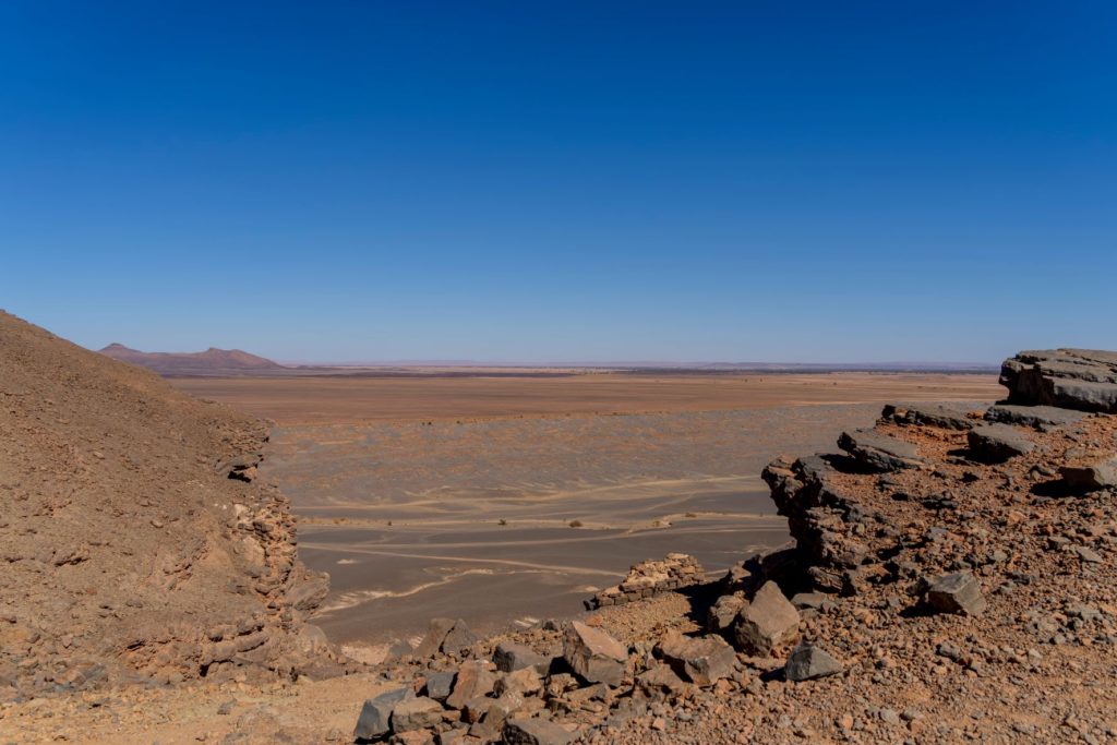 a wide view of the sandy desert of gara medouar in morocco where the mummy was filmed and the theme for Jaya Travel & Tours new On Location.