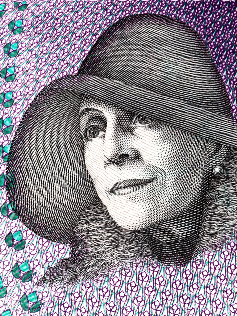 A close up shot of the author Karen Blixen's face printed on money.