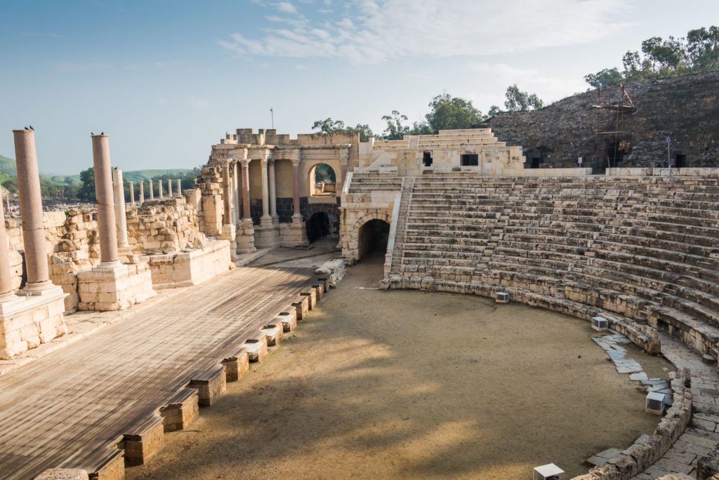 The ruins of an old Roman amphitheater in Beit She'an, where the seats and parts of the façade are still standing making it a popular movie location.