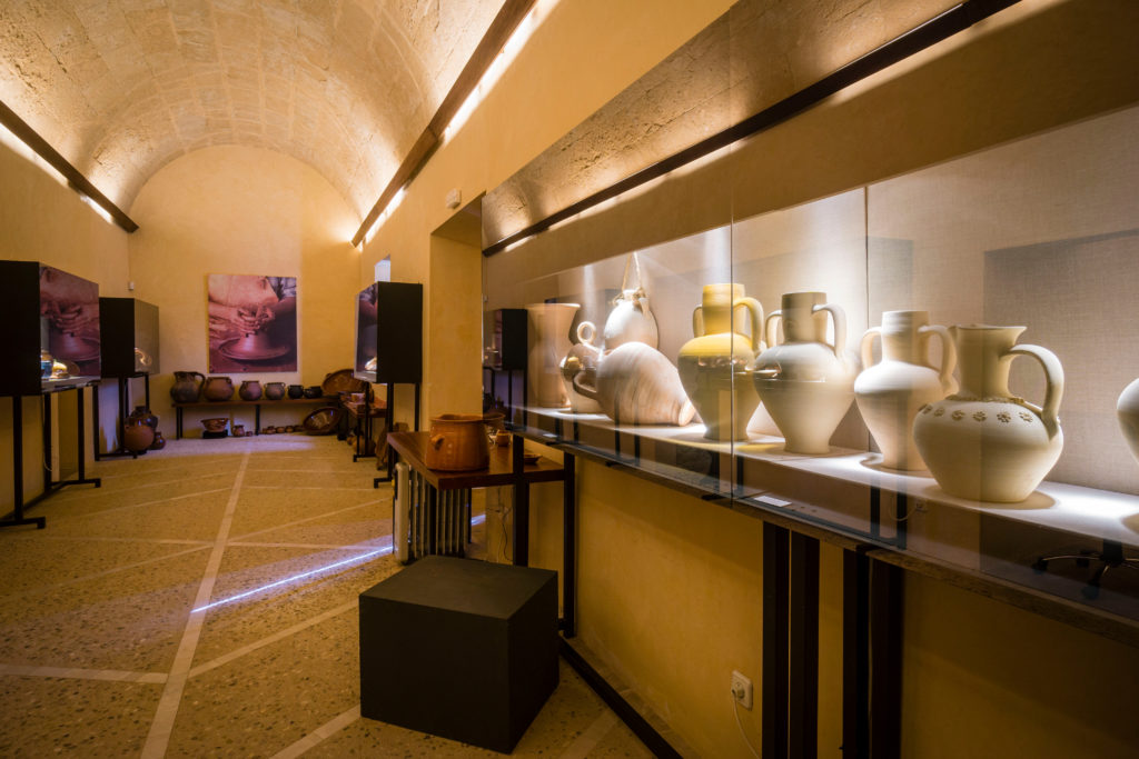 Indigenous made clay pots in a museum gallery hallway in the museum del brasso.