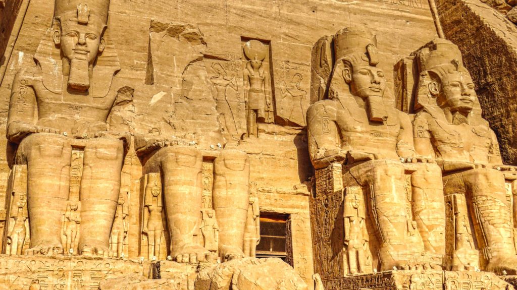 the temple of abu simbel carved into rock with statues of king rameses ii which can be toured with Jaya on a film location vacation.