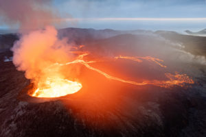 Scenic view of lava in the Fagradalsfjall active volcano in Iceland with hot magma running down the sides that can be seen on travel and tours.