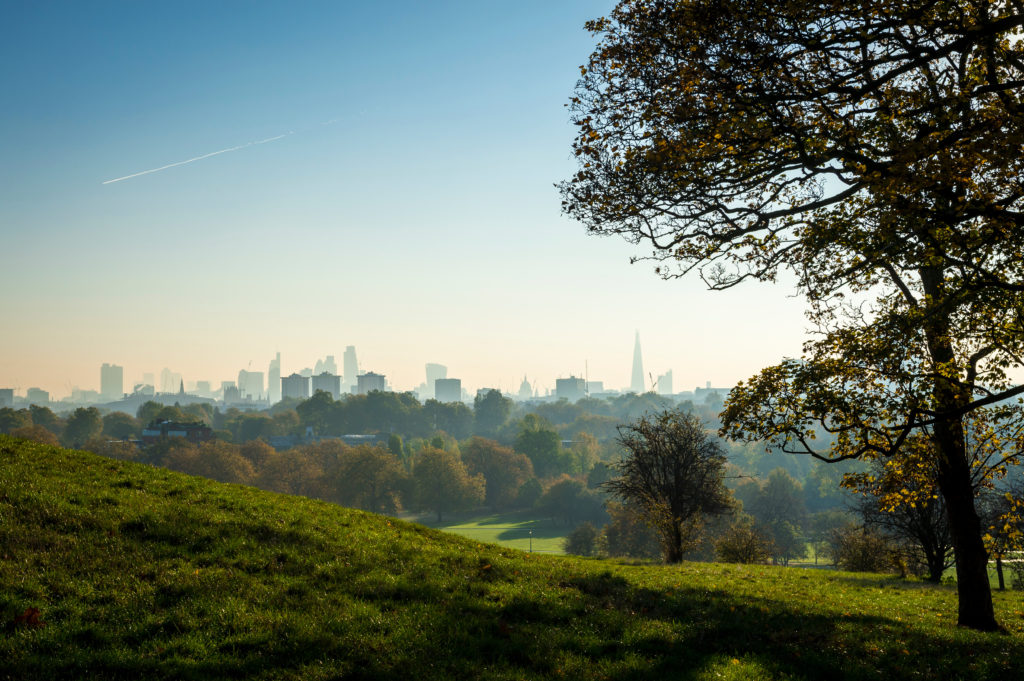 Scenic morning landscape view of London England from Primrose Hill Park in North London at sunrise from Jaya Travel & Tours blog "Vacation During the Autumn Equinox"