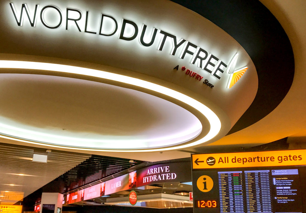 A sign in an airport for a duty-free store is featured in the Jaya Travel & Tours blog post travel guide, "how to travel tax-free internationally," which shares how to get tax exempt and save money on vacation.