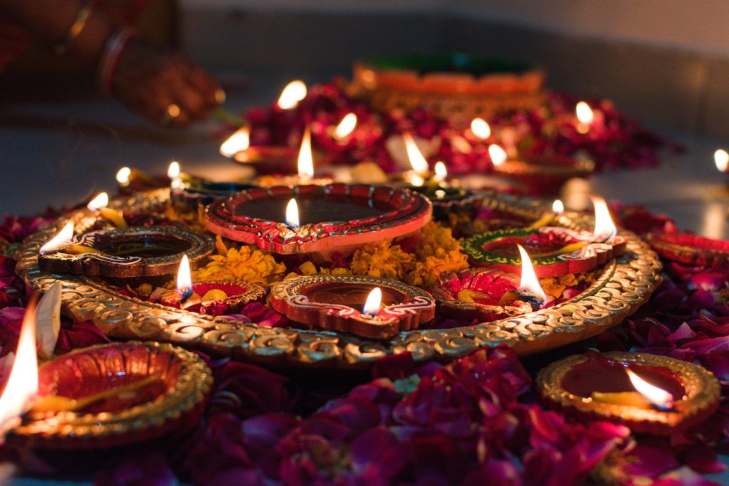 Featured in How to Celebrate Diwali in India by Jaya Travel & Tours, this image shows oil lamps called diyas lit for worship.