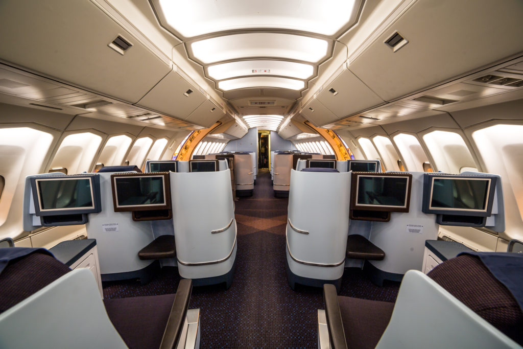 Featured in Guide to Flight Classes by Jaya Travel & Tours, this image shows the spacious cabins in business class on an airplane.