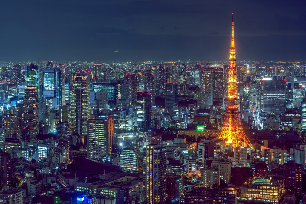 Featured in Futuristic Cities for Vacation by Jaya Travel & Tours, this image shows the skyline of Tokyo, Japan lit up by city lights