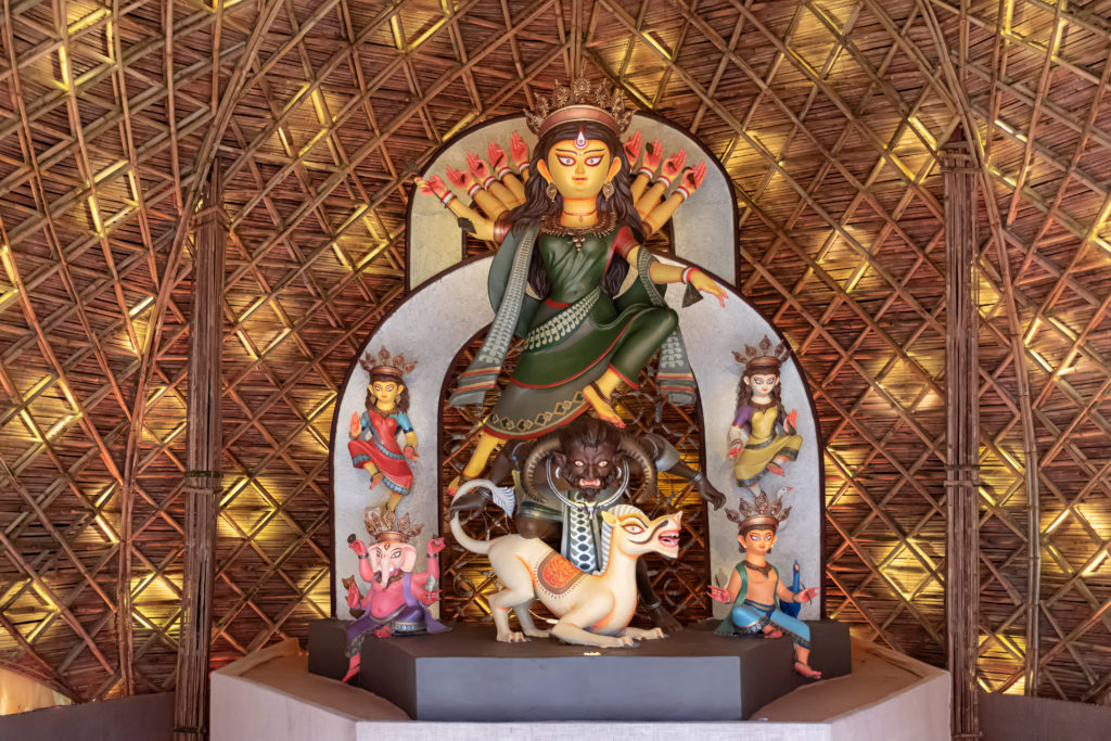Idol of Goddess Devi Durga at a decorated puja pandal in Kolkata West Bengal India in Jaya Travel & Tours blog "Durga Puja in Kolkata Guide"