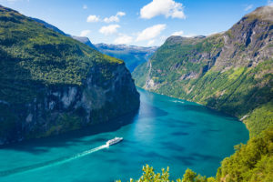 Fjord Geirangerfjord with cruise ship Norway - Jaya Travel & Tours Fjord Geirangerfjord with cruise ship, view from Ornesvingen viewing point, Norway on this Jaya Travel & Tours Scandinavia Group Tour - Scandinavian Delights.