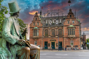 Hans Christian Andersen statue and Tivoli building facade built - Jaya Travel & Tours At the Entrance to Tivoli Garden is the Hans Christian Andersen statue and Tivoli building façade on this Jaya Travel & Tours Scandinavia Group Tour - Scandinavian Delights.