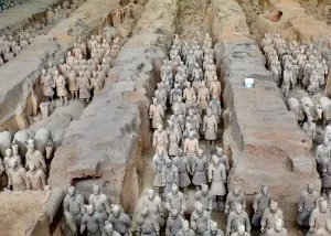xian-antiquities-with-terracotta-army - Jaya Travel & Tours Thousands of life-size terracotta soldiers stand in long clay pits, part of the Qin dynasty mausoleum excavation site for Emperor Qin Shi Huang's tomb.