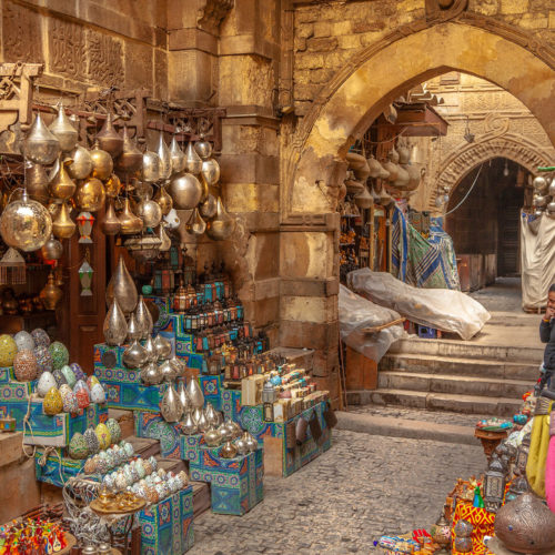 During an excursion with Jaya Travel & Tours, a Khan El Khalili market lamp and lantern shop is visited in Islamic Cairo, Egypt.
